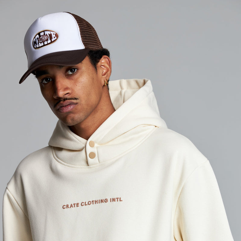 UNISEX OVAL VARSITY TRUCKER CAPS